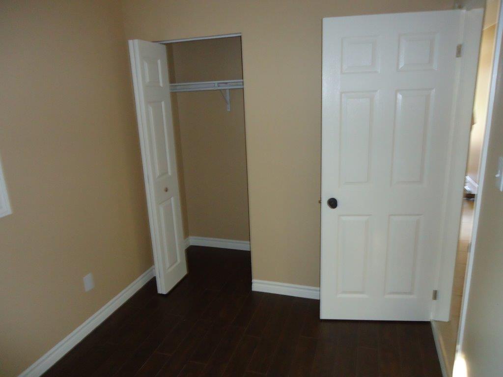 bedroom of rental unit with closet